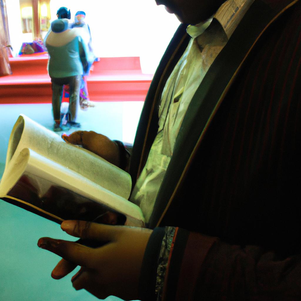 Person reading book at event